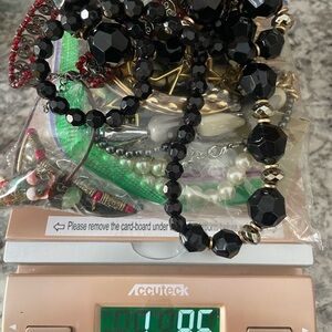 Mystery Bag of Mixed Metal Vintage/Pre Owned Jewelry in Wearable Condition‎